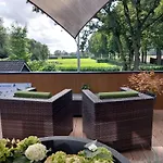 לינה וארוחת בוקר Vierlingsbeek, En Tuin-chalets